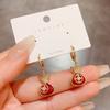 Pendientes de estilo chino con forma de bolso festivo rojo, con hebilla para las orejas, de nicho, ligeros, de lujo, de celebridades de Internet, de moda, joyería de alta gama.