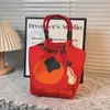 Design de Nicho Bolsa de Mão Vermelha com Padrão para Casamento Bolsa de Presente Festiva em Lona Saco de Balde de Mão com Estampa de Natal Ano Novo