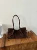 Bolso de hombro retro coreano transfronterizo de gamuza para mujer, nuevo bolso tote de moda de nicho más vendido, bolso de mano para la ciudad, bolso de axila
