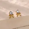 Brincos de aço inoxidável com microincrustação de zircônia brincos de laço rosa em forma de coração brincos cruzados banhados a ouro 18K brincos sobrepostos requintados
