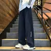 Marca de moda americana Pantalones de chándal grises de peso pesado con corte oblicuo para hombre y mujer Otoño Holgados Adelgazantes High Street Pierna recta Deportivos Casuales Pantalones largos