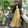 Vestido de tirantes amarillo atmosférico sin espalda estilo francés para mujer, vestido largo de encaje estilo resort de verano