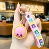 Llavero de moño moderno y popular, colgante de muñeca con emoji lindo, decoración para mochila de estudiante, regalo pequeño, mercancía de puesto callejero
