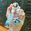 Miniatura Cartoon com Óleo e Areia Líquida Chaveiro Panda Chaveiro de Carro Requintado Pingente de Bolsa Pequeno Presente Venda por Atacado