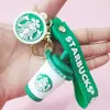 Llavero de taza de té con leche de Starbucks de nueva llegada transfronterizo, colgante de coche de dibujos animados, muñeca, joyería, llavero lindo para bolso