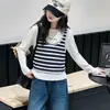 Traje de Niña Primavera/Otoño 2026 Estilo Nuevo Niños Grandes Falso Dos Piezas Top Rayado Pantalones de Mezclilla Elegante Moderno Conjunto de Dos Piezas