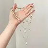 Colar com pingente de estrela de seis pontas multicamadas vintage para mulheres, corrente para clavícula com borla brilhante de luxo leve de nicho de alta qualidade