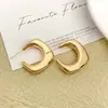 Pendientes Transfronterizos Europeos y Americanos Chapados en Oro con Textura Metálica, Estilo Minimalista Francés, Pendientes Irregulares en Forma de C de Moda al por Mayor