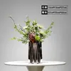 Arreglo Floral de Simulación Moderno Maceta de Acero de Lujo Ligero Oficina de Ventas de Sala de Muestras Sala de Estar Adornos de Flores Artificiales Decoración de Mesa de Comedor
