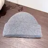 Chapéu de Lã Casual Versátil Cor Sólida Quente para Mulheres Proteção de Orelha de Inverno Chapéu de Tricô Pulôver para Proteger Contra o Frio e o Vento Tendência de Chapéu Frio para Exterior