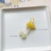Precio mayorista directo de fábrica pulsera hecha a mano pulsera con colgante diy accesorios pequeños deslizantes colgante de garra de gato lindo Joker