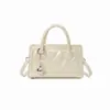 Bolso de mano de nicho de lujo para mujer con un elegante diseño coreano, bolso de hombro acolchado de alta gama, bolso pequeño cruzado