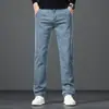 Jeans rectos de alta gama para hombre, nuevo estilo primavera y otoño 2026, pantalones de hombre elásticos de corte holgado, pantalones largos casuales de negocios para hombres jóvenes y de mediana edad