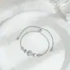 Joia de Mão Elegante com Zircônia Micro-Incustada Banhada a Ouro Real para Mulheres, Pulseira Ajustável de Puxar Coração Cheia de Diamantes de Alto Padrão Atacado
