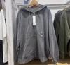 Centro comercial misma primavera y otoño para hombre y mujer con capucha y cremallera chaqueta cárdigan deportivo suéter de manga larga 465201/460324