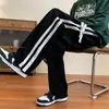 Pantalones de primavera y otoño para hombre de pana high street tendencia ins deportivos combinan con todo rectos holgados de marca moderna con caída pantalones casuales