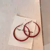 Hebilla de Oreja de Círculo Rojo Ankora Transfronteriza Europea y Americana Pendiente de Aro de Vidrio Rojo Estilo Hong Kong Antiguo Pendientes Sencillos de Nicho