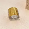 Moda Transfronteriza Europea y Americana Anillos de Acero Inoxidable Diseño de Nicho de Lujo Ligero Empalme Oro y Plata Anillos de Acero de Titanio Abiertos Versátiles