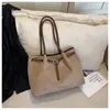 Bolsas de mão retro de camurça super quentes deste ano 2026 novo estilo bolsa para trabalho e trajeto bolsa de grande capacidade feminina