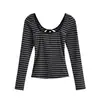 Camiseta de manga larga ajustada a rayas, estilo europeo y americano, para mujer, venta al por mayor, nueva para principios de otoño, pura deseo, sexy, sin espalda, con tirantes