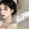 Pendientes de Clip de Lujo Ligero Estilo Hong Kong sin Agujeros para Orejas Pendientes Geométricos de Perla y Camelia para Mujer Sentido Avanzado Simples Elegantes Pendientes Versátiles