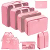 Set organizador de viaje premium, incluye 11 piezas: bolsas para guardar ropa, bolsas con cordón, bolsas para cosméticos y artículos de tocador, y bolsas de malla plegables para almacenamiento