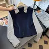 Suéter de punto falso dos piezas para mujer, nuevo estilo primavera y otoño 2026, cuello polo, diseño corto holgado, adecuado para figuras petite, prenda exterior