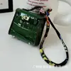 Colgante Mini Bolso Kelly Patrón Cocodrilo Piel Lindo Colgante de Mini Bolso Colgante de Estuche para Auriculares Apple de Gama Alta