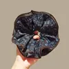 Goma para el pelo de lunares florales de hada atmosférica para mujer, estilo coreano, nicho, cuerda para el pelo, flor de pelo elegante