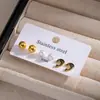 Brincos de aço inoxidável transfronteiriços europeus e americanos para mulheres, contas redondas na cor dourada, estrelas em esmalte preto, conjunto de brincos de moda de três peças com zircônia