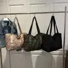 Bolsa Tote de Ombro Texturizada Simples Casual Versátil Moda Inverno 2026 Nova Grande Capacidade Tendência