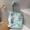 En stock: Nuevo bolso de mano estilo Jennie 2026, hecho con satén de seda británica genuina, un bolso tote o bolso de hombro para mujer