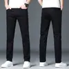Jeans blancos de alta gama para hombre, nuevos pantalones rectos ajustados de otoño, pantalones largos elásticos casuales de moda para hombre, nuevo estilo