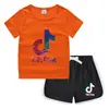 Camiseta de cuello redondo para niños, pantalones cortos, camiseta informal coreana, conjunto de camiseta interior absorbente de sudor, de caramelo, de verano 2023
