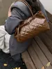 Bolso Transfronterizo para Mujer 2025 Nuevo Popular Estilo Coreano Moderno Sencillo Acolchado Gran Capacidad Portátil Bolso de Hombro Tote para Mujer