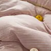 Estilo minimalista nuevo juego de cuatro piezas de gasa de doble capa transpirable 100% algodón para dormitorio, ropa de cama de dos tonos estampada estilo INS 100% algodón