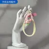 Lindo Colgante de Teléfono de Muñeca Fruta Estrella Colorido Cordón Tejido Corto Correa Colgante de Personaje de Dibujos Animados Duradera