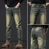 Jeans vintage retro de alta gama para hombre, corte recto holgado, teñidos de barro amarillo, lavados y desgastados, nuevos pantalones de hombre de outlet para primavera/otoño