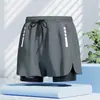 Bañador para hombre, nuevo estilo de verano, moderno, de secado rápido, de doble capa, anti-vergüenza, corte holgado, talla grande, shorts de playa con frente plano