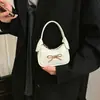 Bolsa infantil con lindo lazo, bolso de mano para bebé, mini bolso compacto de media luna, bolso de cadena simple de color liso para niños y niñas