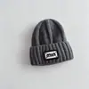 Gorro tejido divertido con forma de dinosaurio para niños, gorro de lana cálido para otoño e invierno que cubre las orejas del bebé, bonito gorro de punto para niños y niñas