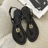 Sandalias Chanclas de Mujer Nuevas Verano 2025 para Exteriores de Suela Plana Nicho Versátiles de Moda Chanclas Romanas con Tira en T