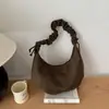 Bolso vintage de gamuza transfronterizo para mujer, nuevo bolso de hombro para el trabajo de nicho otoño 2026, bolso bandolera plisado tipo bola de masa