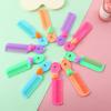 Lindo mini peine para niños de dibujos animados portátil flequillo cabello suelto peine de dientes de cabeza redonda peine para el cabello de niña
