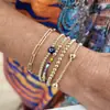 Pulsera Estilo Bohemio Europeo y Americano Ojo de Diablo con Perlas de Oro de 14K Set de Pulseras Multicapa Joyería para Mujer