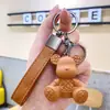 Colección de colgantes promocionales de vendedores ambulantes: llaveros de oso violentos de moda, colgantes para bolsos, colgantes de dibujos animados lindos para llaves