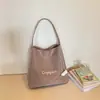 Bolsa Feminina Nova Moda Transfronteiriça 2026 Bolsa de Ombro Tendência Estilo Ins Bolsa Tote de Lona Grande Capacidade Casual