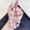 Bolsa de Moda Romántica de Gatito de Caramelo Colorido Llavero Colgante Super Hada Cristal Lanyard para Teléfono Colgante de Perlas
