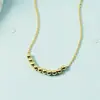 Collar de Cuentas Redondas de Frijoles Dorados Pequeños para Mujer Colgante de Diez Bellezas Perfectas Cadena para Clavícula Versátil de Estilo Fresco de Alto Gama Dorado Nuevo 2021