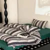 Algodón de punto de algodón Clase A Juego de cuatro piezas Ropa de cama para dormir sin nada Kit de algodón Tianzhu amigable con la piel para dormitorio de estudiante Sábana Funda de edredón 1.8